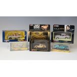 A Dinky Toys No. 153 Aston Martin DB5, within a plastic display box, together with twelve Corgi