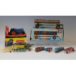 A Britains No. 9525 Fordson Super Major tractor and a No. 9560 timber trailer, both boxed with inner