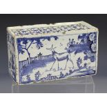 An English Delft flower brick, circa 1740, painted in blue with a stag in a chinoiserie landscape to