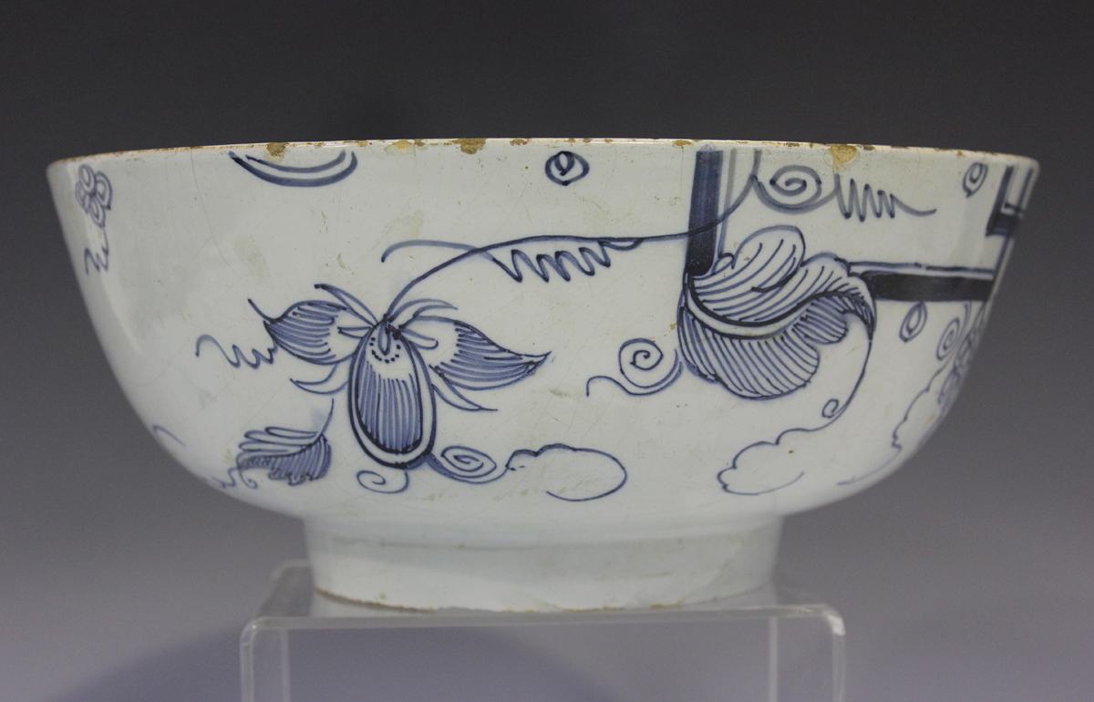 An English Delft circular bowl, Bristol or London, circa 1740, painted in blue with a version of the - Image 6 of 8