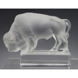 A Lalique clear and frosted glass buffalo paperweight, post-1945, engraved mark 'Lalique France'