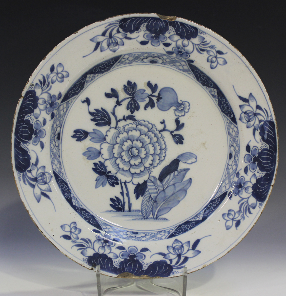 An English Delft charger of 'Ann Gomm' type, London, circa 1790-95, polychrome painted with a - Image 5 of 8