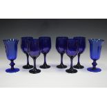 A mixed group of table glassware, 20th century, including a set of six 'Bristol' blue glass wines, a