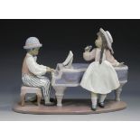 A Lladro porcelain figure group Jazz Duo, No. 5930, length 31cm, boxed.Buyer’s Premium 29.4% (