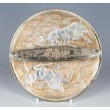 A Lalique sepia stained glass Art Deco Deux Chèvres hand mirror, designed 1927, of circular shape