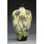 A Moorcroft Hepatica pattern vase, circa 2003, designed by Emma Bossons, height 15.7cm.Buyer’s