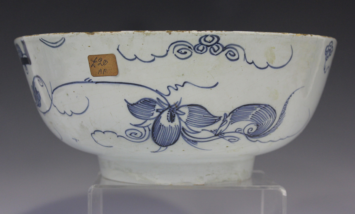 An English Delft circular bowl, Bristol or London, circa 1740, painted in blue with a version of the - Image 8 of 8