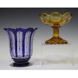 A Bohemian blue flashed glass vase, early 20th century, the faceted, flared cylindrical body