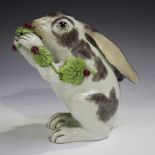 A Samson porcelain Meissen style model of a rabbit, late 19th century, modelled on its hind quarters