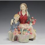 A Royal Doulton figure The Little Mother, HN1641, height 19.5cm (faults).Buyer’s Premium 29.4% (