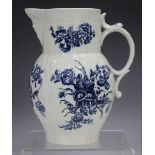 A Caughley Bouquets pattern blue printed cabbage leaf moulded jug, circa 1780, with mask spout, blue