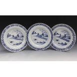 Three English Delft plates, mid-18th century, each painted in blue with a chinoiserie landscape