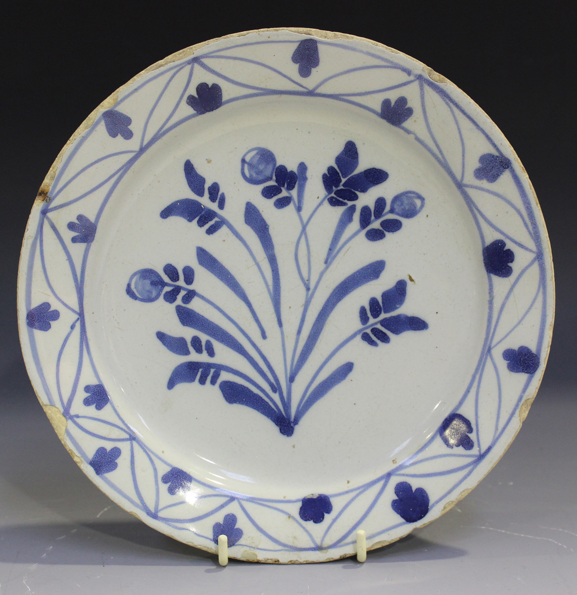 A naïve English Delft plate, probably London or Bristol, mid-18th century, of 'pancake' form, - Image 5 of 7