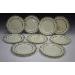 A set of eleven creamware plates, late 18th/early 19th century, with basketweave moulded rims and