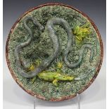 A Jose Francisco de Sousa majolica Portuguese Palissy Ware dish, 1860-93, applied with a long grey