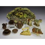 A miniature pottery part tea service, possibly Measham, late 19th century, comprising teapot and