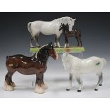 A Beswick grey mare and brown foal group, No. 1811, height 15cm, together with two other Beswick