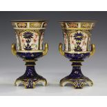 A pair of Royal Crown Derby Japan pattern vases, circa 1901, of campana urn form with gilt