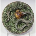 A Mafra majolica Portuguese Palissy Ware dish, late 19th century, applied with a snake, toad and