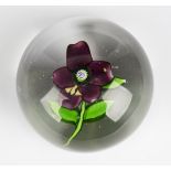 A St Louis glass pansy paperweight, circa 1850, the five-petalled purple flower with ochre detail on