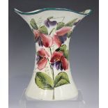 A Wemyss pottery Lady Eva shape vase, early 20th century, painted with sweet peas, green painted