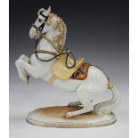 An Austrian Vienna porcelain model of a Spanish Riding School horse, 20th century, the white rearing