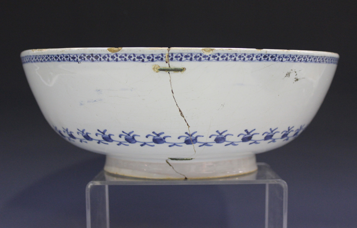 An English Delft circular bowl, London or Bristol, circa 1760, the exterior painted in manganese and - Image 7 of 14