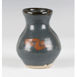 An early Bernard Leach St Ives studio pottery stoneware vase, with reddish brown brush-drawn