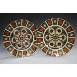 A pair of Royal Crown Derby 1128 Imari pattern dinner plates, circa 1977, cancelled red printed