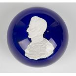 A French glass blue ground sulphide paperweight, probably Clichy, circa 1850, set with a portrait