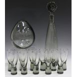 A Holmegaard smoked Canada pattern glass decanter and stopper and eleven matching glasses, 1950s,