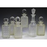 A mixed group of fourteen mostly cut glass decanters and thirteen stoppers, 19th and 20th century,