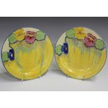 A pair of Clarice Cliff Bizarre Delicia Pansy tea plates, 1930s, black printed marks to bases,