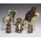 A Beswick beaver, No. 2195, height 11.9cm, together with four Beswick koala bears, comprising Nos.