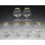 A set of six Moser Lady Hamilton pattern brandy glasses, with gilded rims and hexagonal feet, acid