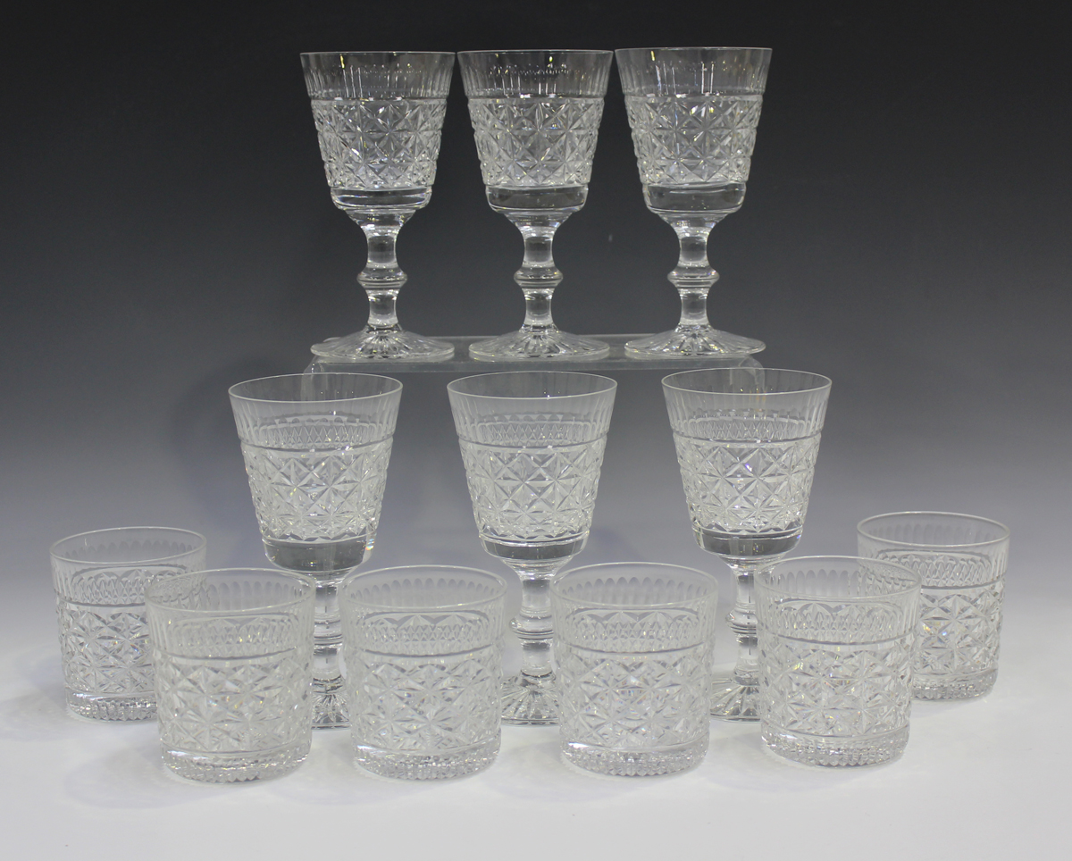 A set of six Edinburgh crystal whisky tumblers and six matching claret glasses, heights 7.7cm and