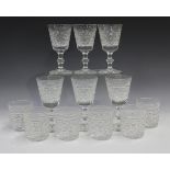 A set of six Edinburgh crystal whisky tumblers and six matching claret glasses, heights 7.7cm and