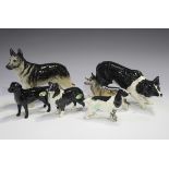 Five Beswick dogs, comprising Alsatian, No. 969, Cocker Spaniel, No. 967, Alsatian, No. 1762A,