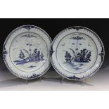A large pair of English Delft chargers, Lambeth, circa 1780, painted in blue with a chinoiserie