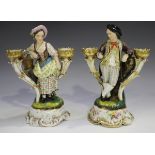 A pair of Jacob Petit porcelain candelabra figures, mid-19th century, modelled as a boy and girl