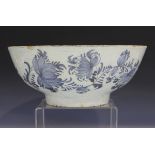 An English Delft circular punch bowl, possibly Liverpool, circa 1770, painted in blue to the