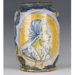 An Italian maiolica cylindrical storage or drug jar, Calabrian, 17th century, painted in the