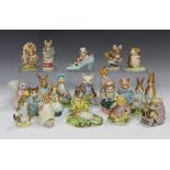 Twenty-two Beswick Beatrix Potter's figures, comprising Pigling Bland, The Old Woman Who Lived In