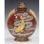 A rare Coalport aesthetic japonaiserie flask, 1880s, the rich brown ground relief decorated with a