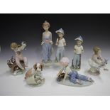 Seven Lladro porcelain figures, comprising Pick of the Litter, No. 7621, Best Friend, No. 7620,