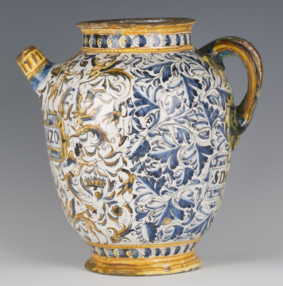 An Italian maiolica wet drug jar, probably Deruta, 17th century, the ovoid body painted to the front - Image 8 of 9