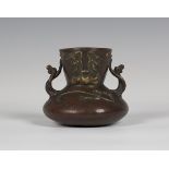 An Italian Art Nouveau two-handled pottery vase, circa 1900, the squat bulbous body with flared