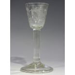 A plain stem wine glass, mid-18th century, the round funnel bowl engraved with a game bird in