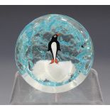 A William Manson limited edition glass paperweight, dated 2003, decorated with a penguin standing on