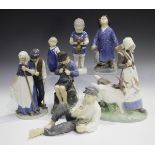 Six Royal Copenhagen figures, comprising Boy at Lunch, No. 865, Boy with Umbrella, No. 3556, Harvest